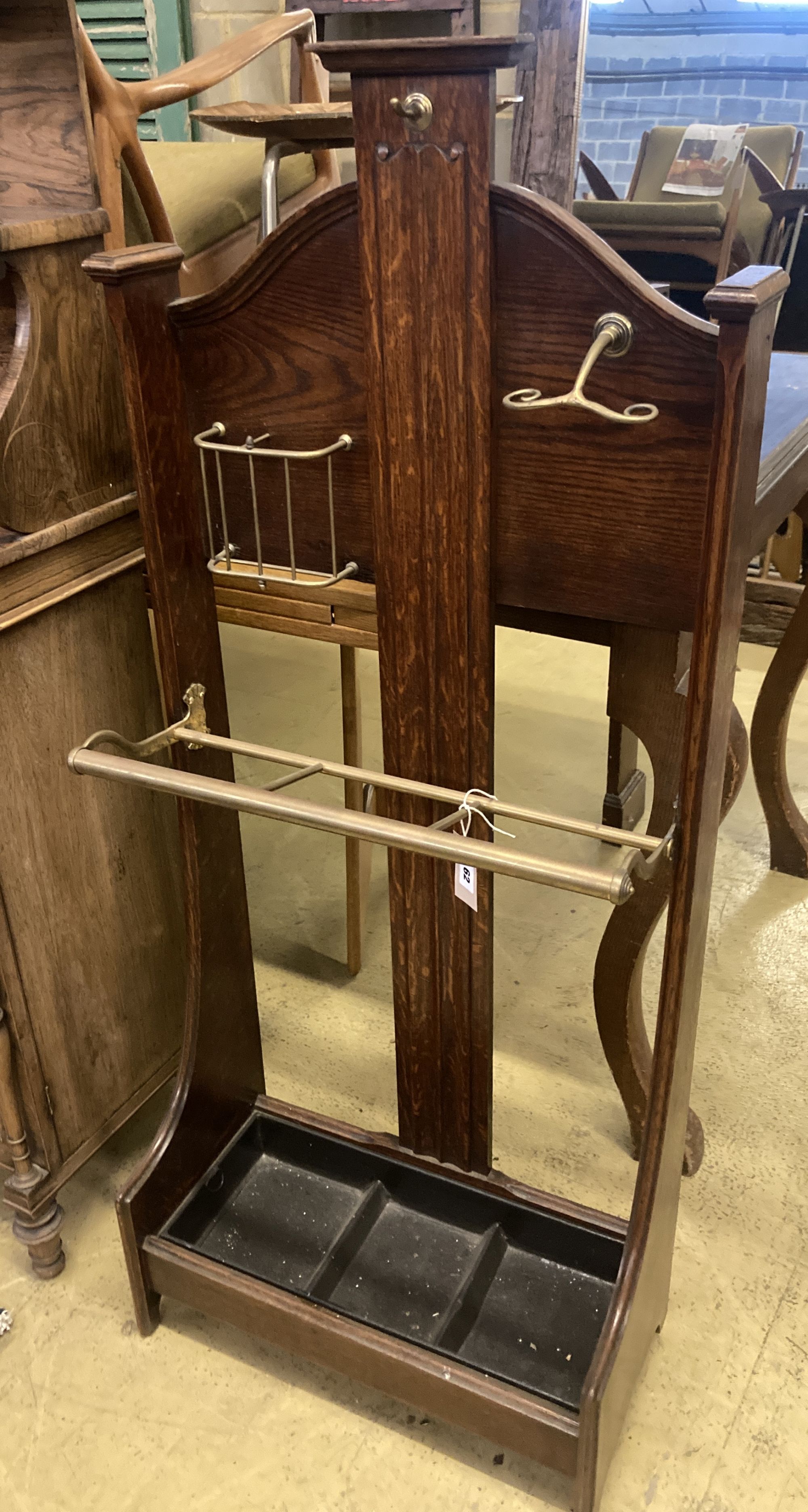 An early 20th century brass mounted oak hall stand, width 57cm depth 26cm height 130cm